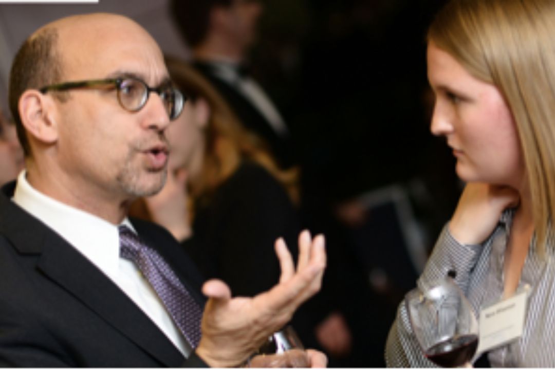 Man speaking to GW student