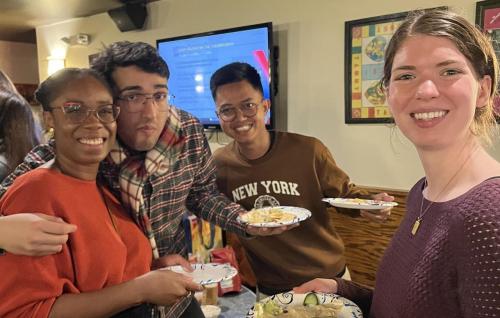 Four Trachtenberg School graduate students at the Environmental Policy Happy Hour